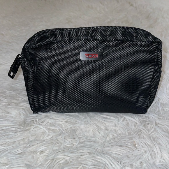 Tumi Handbags - Tumi for Delta Pouch